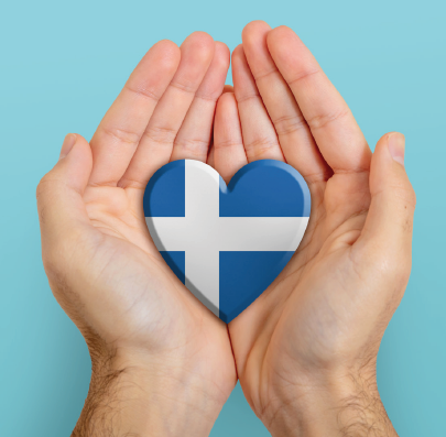 Hands holding Shetland flag in a heart shape
